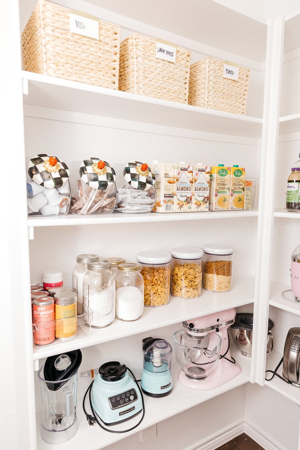 baking ingredients organized in mason jars in pantry