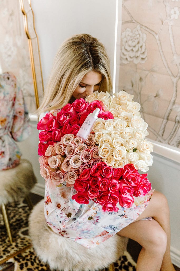 Girl Smelling Flowers